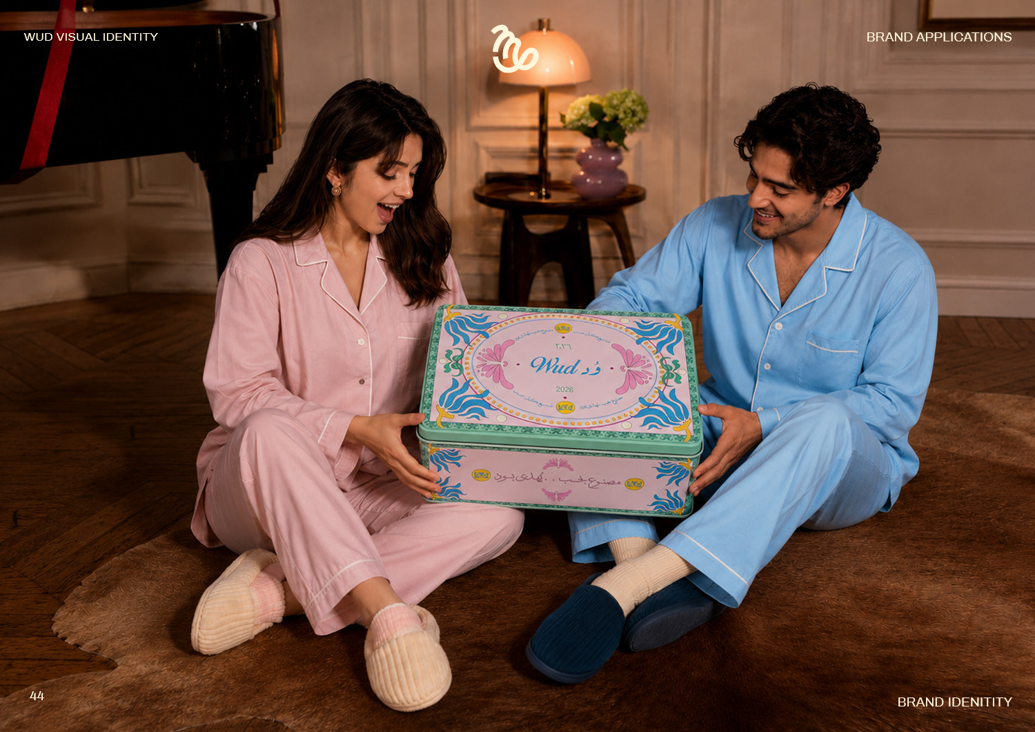 Couple opening WUD tin keepsake box by piano